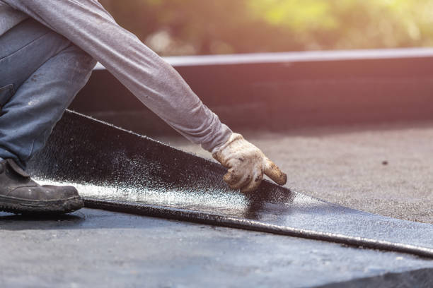 Professional Basement Waterproofing technician working in Duluth, WA